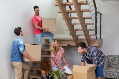 Packed boxes and furniture for household storage in Waddon