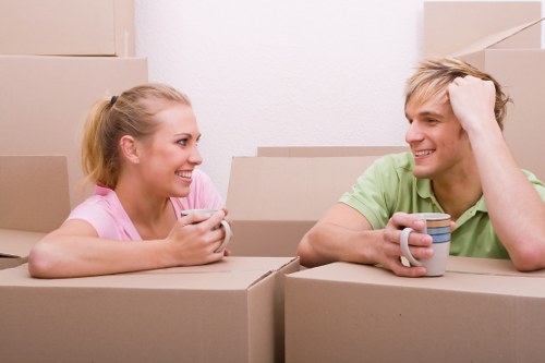 Professional house removals in Waddon with moving van and packed boxes