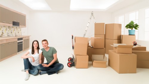 Professional movers handling furniture during a Waddon relocation