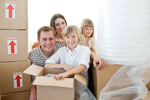 Professional movers loading a van during a Waddon relocation